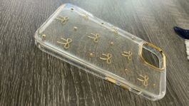 iPhone 15 Pro Hülle transparent mit Schleifen und Gold