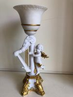 Figurine ange avec bougeoir en céramique