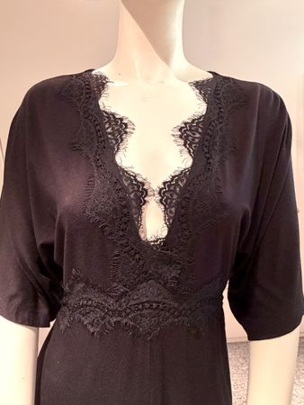 Très élégante robe-culotte noir 36