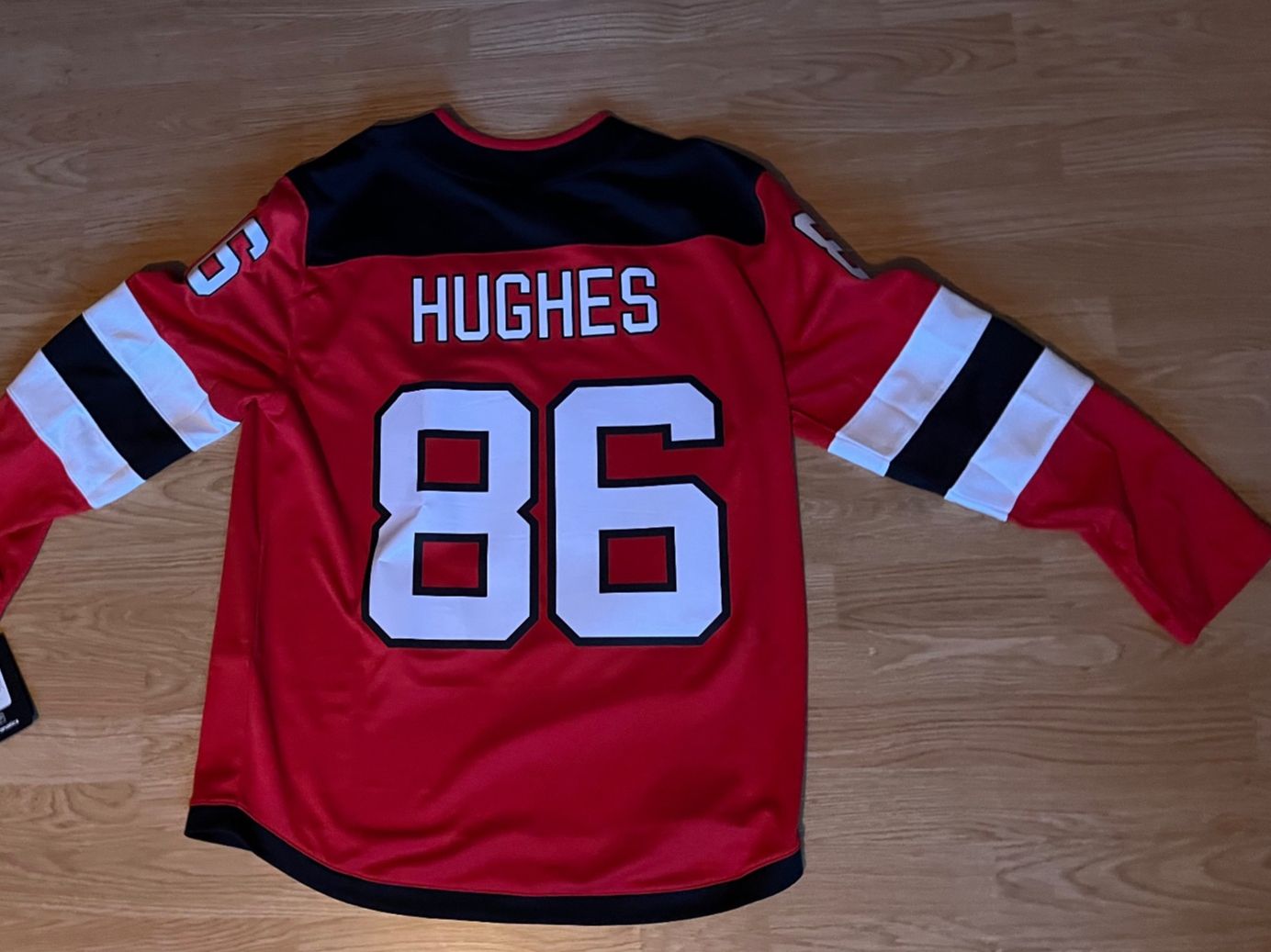 NHL Leibchen & Hosen: NHL New Jersey Devils rotes Trikot – Neu und originalverpackt aus Aarau von Moonie.00 1