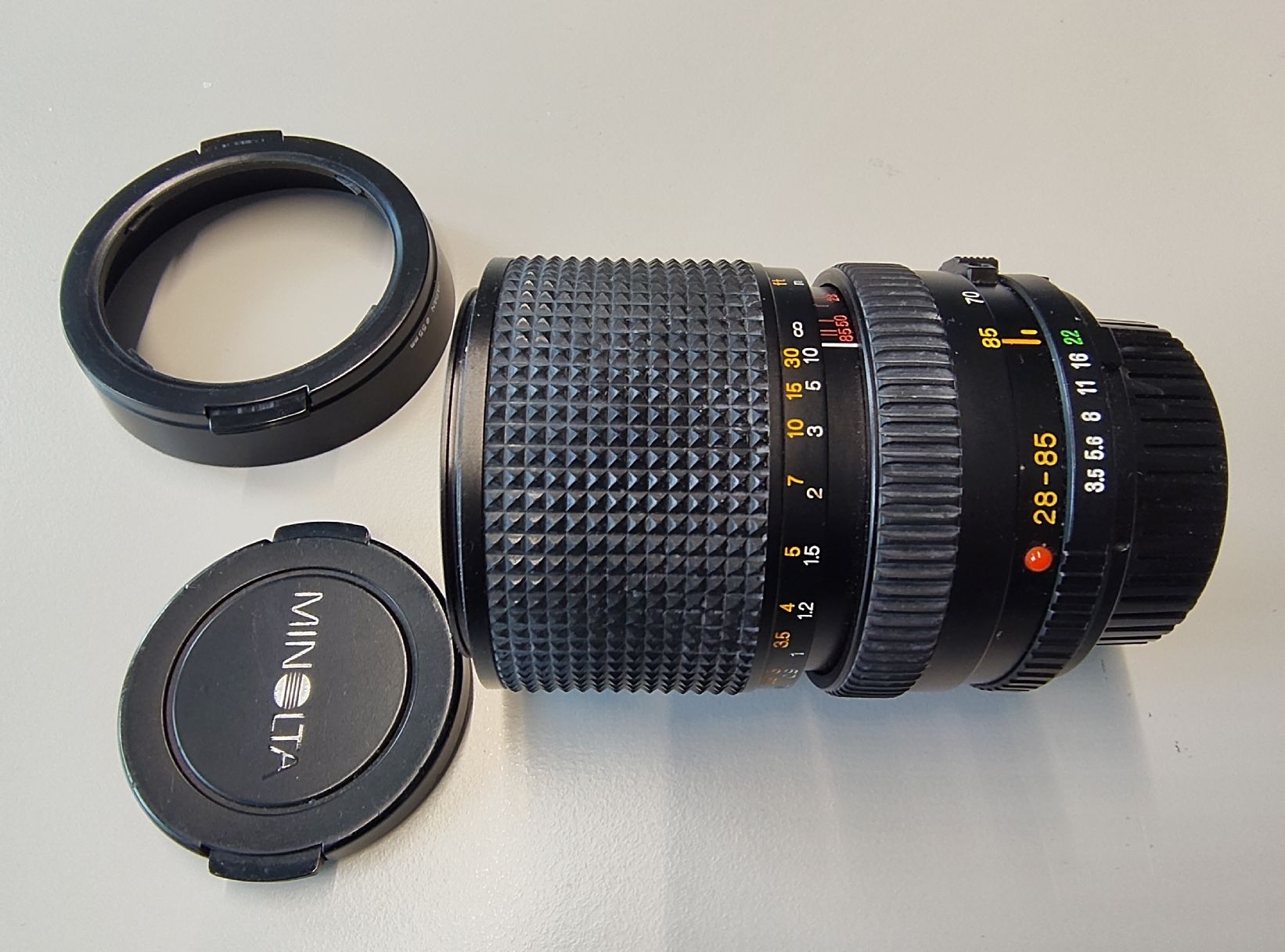 Minolta Obiettivi: Minolta MD Zoom 28-85mm 1:3.5-4.5 – Usato da Zürich venduto da s_a11 2