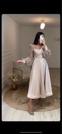 Elegantes Kleid mit Paillettenärmeln, Grösse40, neuwertig