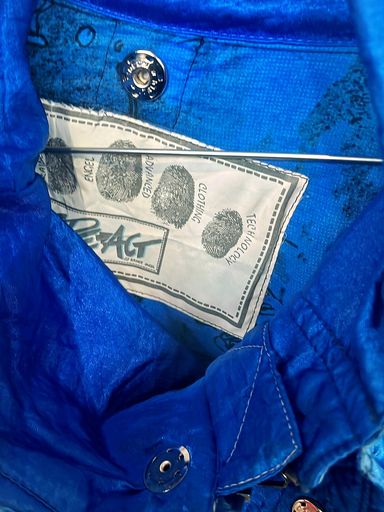Giacche: Vintage ORAGI Blaue Windjacke mit abstraktem Muster – Usato da Zug venduto da vinokilo 3