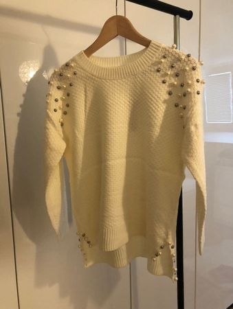 Weisser Pullover