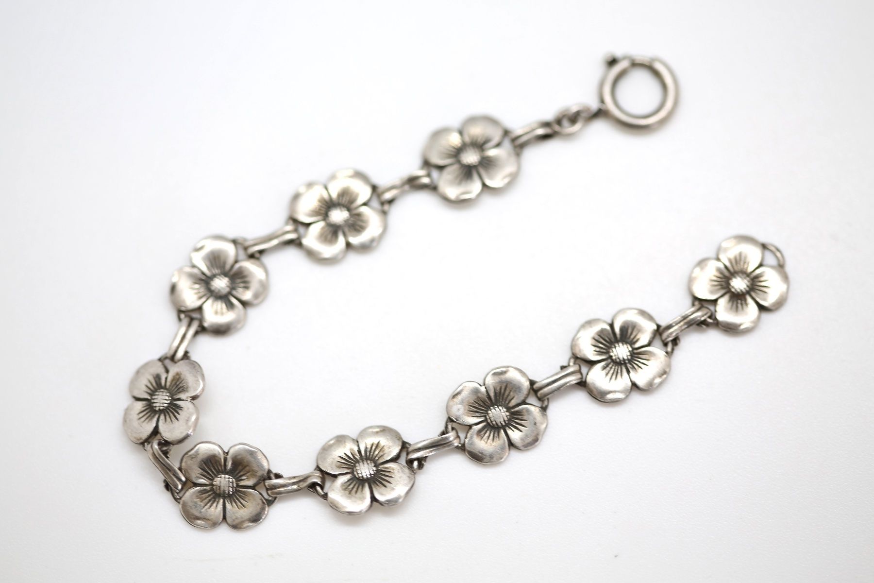 Bracciali & Braccialetti: Silber Armkette mit Blumenmotiven – Usato da Reinach BL venduto da Han-Numismatik 1
