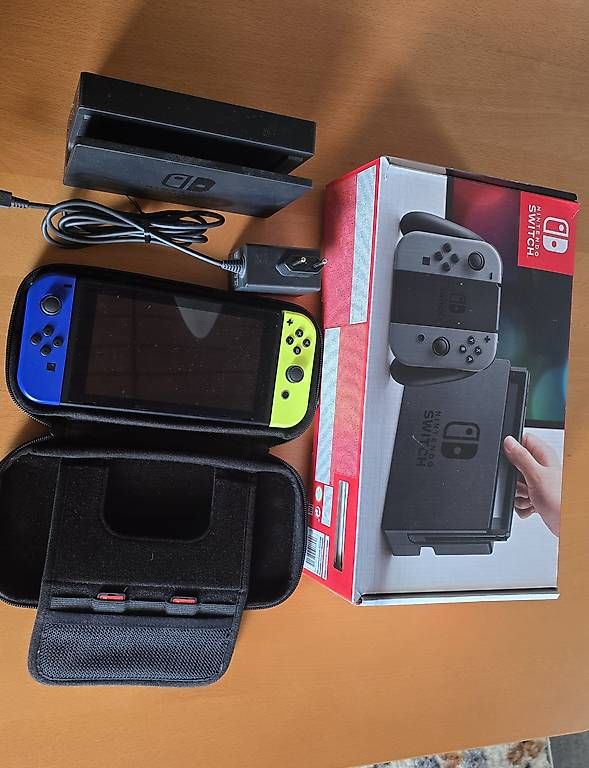 Konsolen: Nintendo Switch Complet mit 3 Spielen  – Gebraucht aus Luzern von 40carti 1