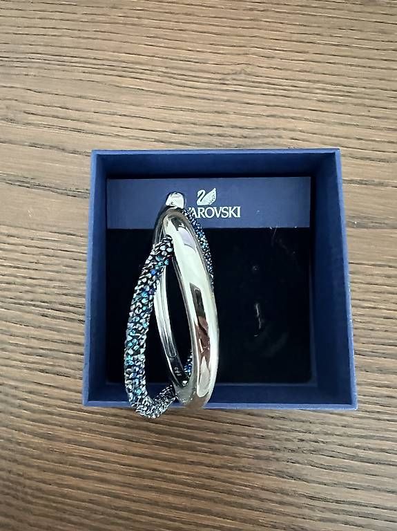 Bracciali & Braccialetti: Swarovski Armreif Crystaldust, blau – Usato da Glattpark(Opfikon) venduto da joe_5cs9 2