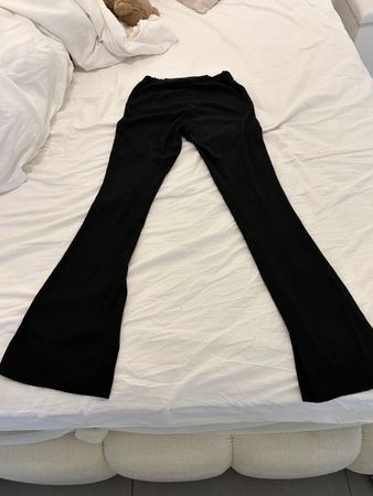 Pantalon évasé noir taille élastique état correct
