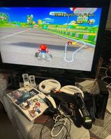 Nintendo Wii Console, Fit Board, Samsung TV, viele Zubehör