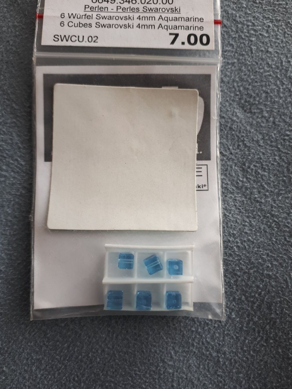 Perlen (unechte): 6 cubes Swarovski 4 mm aquamarine – Neu und originalverpackt aus Ferlens VD von sunshine321