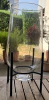 A transparent vase - comes with the box