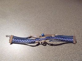 Armband blau/ver. Stränge/Anhänger, Flügel