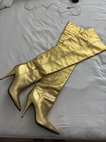 Saint Laurent golden knee high boots 