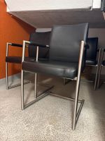 4 schwarze Esszimmerstühle / Schwingstühle