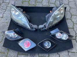 Frontscheinwerfer / Rücklichter: Mazda 3 (2003-2009)