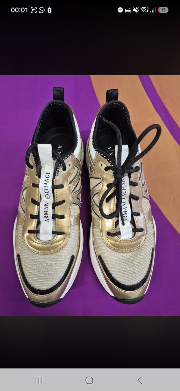 Armani Scarpe da uomo: Baskets Armani Exchange ornées dorées taille 40 comme neuf – Nuovo (secondo la descrizione) da St-Pierre-Clages venduto da _RV