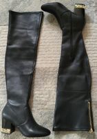 Cuissardes Guess, pointure 38, pratiquement neuves.