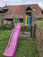Spielturm mit Rutsche und Schaukel zu verkaufen