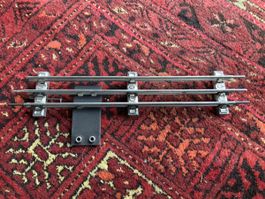 1 Stk. Blech-Anschlussstück Spur 0 von Märklin. 