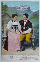 AK: Paar in Berner Tracht vor Jungfrau-Massiv, 1907