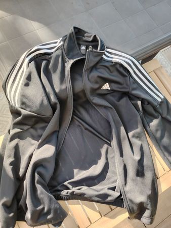 Veste Adidas noire à rayures blanches, taille XL, comme neuf