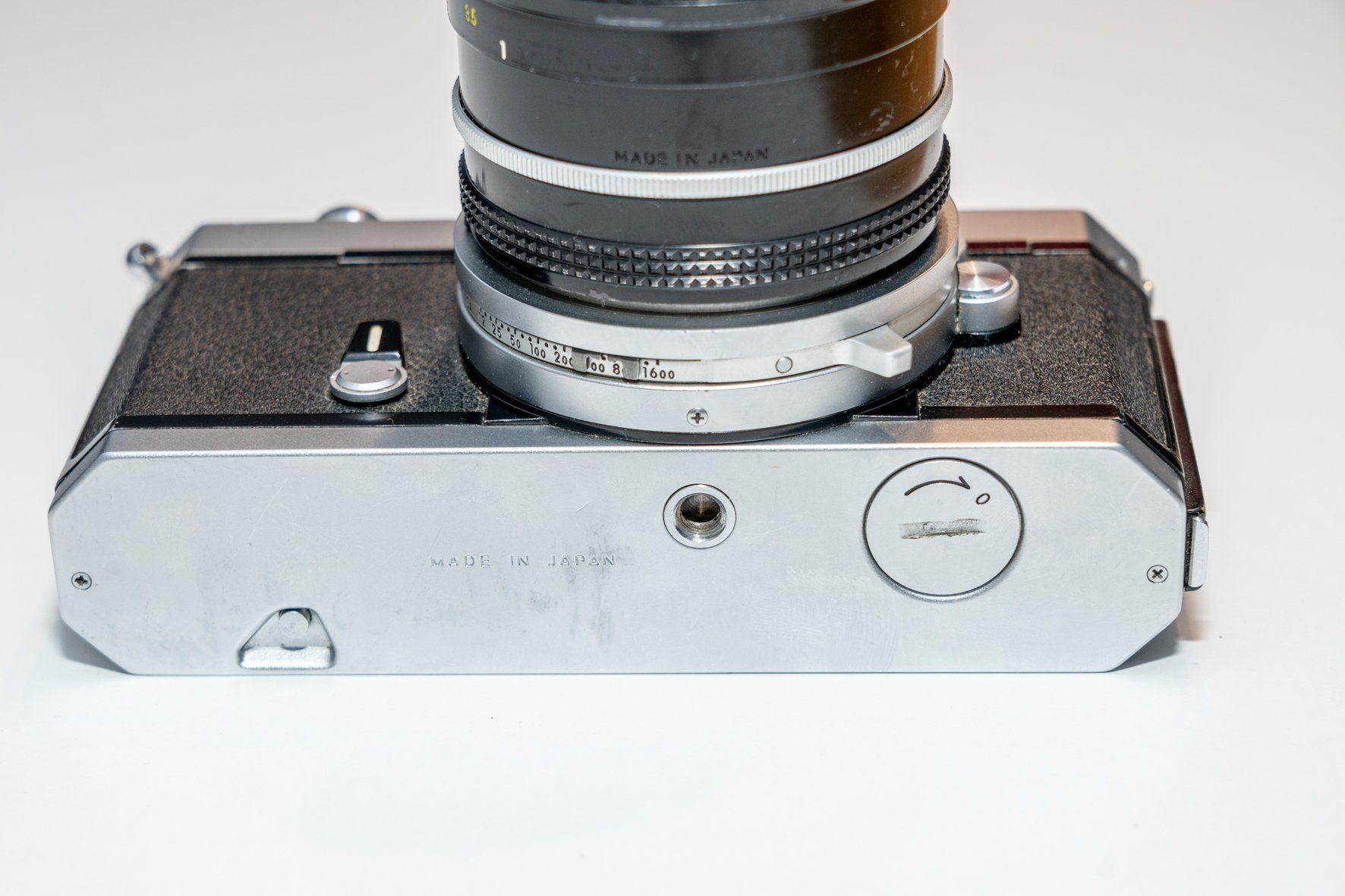 Nikkormat Kamera: Nikkormat + Nikkor 105mm 1:2.5 – Gebraucht aus Grandvaux von RGKeller 8