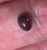 0,8 ct Opale noire naturelle à reflets floraux
