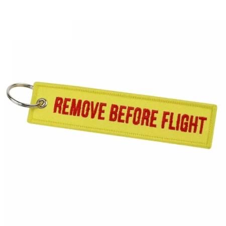 Portachiavi: Schlüsselanhänger REMOVE BEFORE FLIGHT gelb Version 2 – Nuovo e nell'imballaggio originale da Bern venduto da aeroshop.ch
