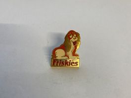 Pin's  Friskies chien métal doré motif animalier état neuf