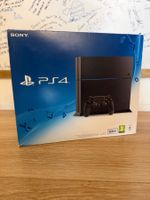 PS4, 2 Controller & 4 Games - Fast ungebraucht