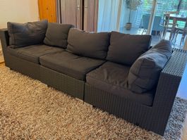 Gartenlounge Ecksofa aus dunkelgrauem Polyrattan