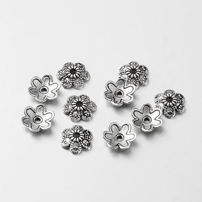 Perlen (unechte): Perlenkappe Blume Antik Silber 9x2mm / 100Stück – Neu (gemäss Beschreibung) aus Rüegsau von Tausendfreund