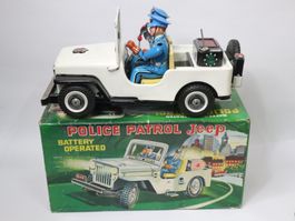Grosses Blechauto Police Patrol Jeep made in Japan