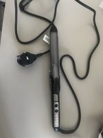 Hair curler with type G plug