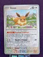 Eevee Evoli - Reverse Holo - Pokemon Surging Sparks