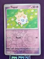 Togepi - Reverse Holo - Pokemon Surging Sparks