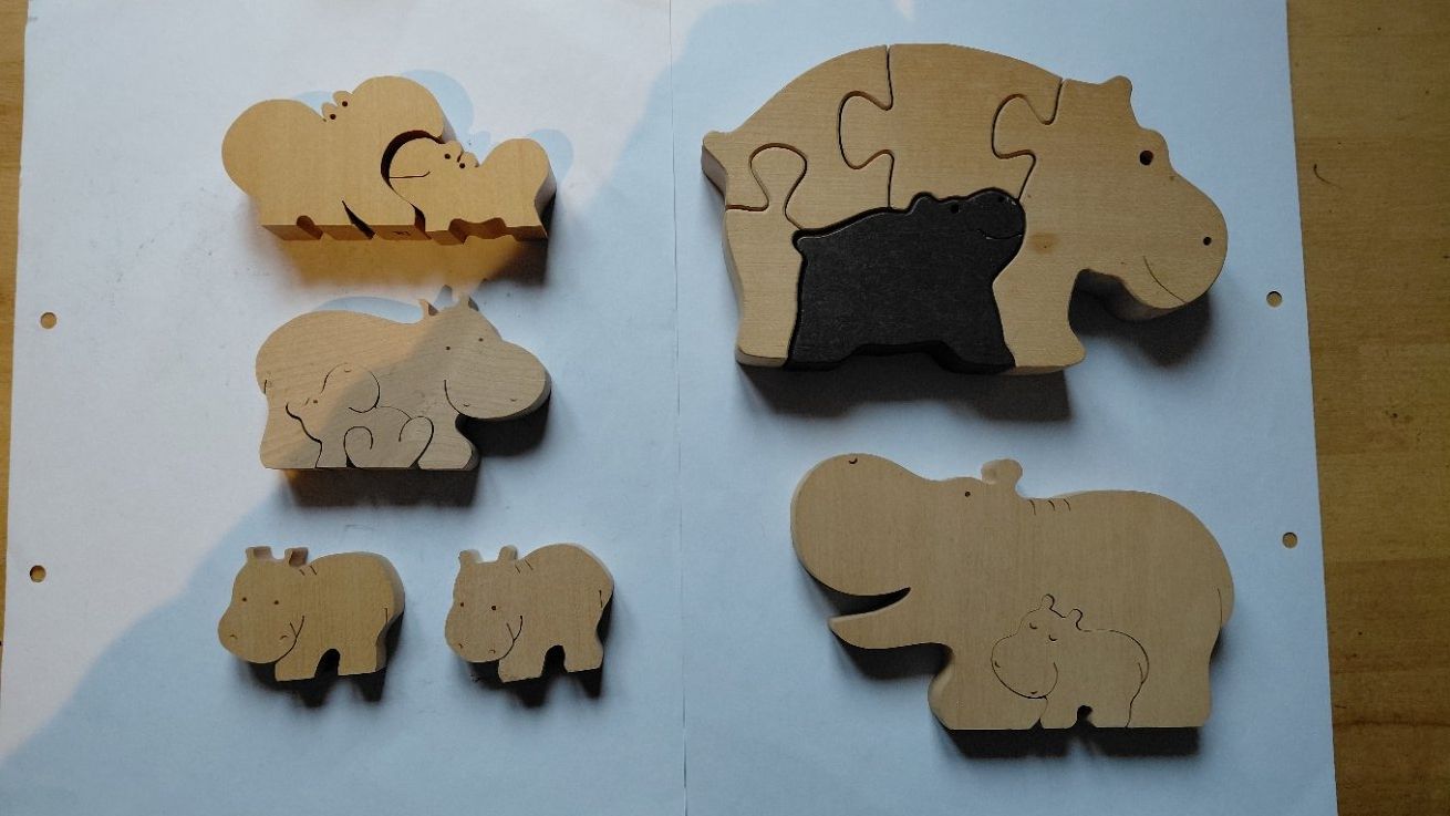 Jouets: Holzpuzzle Nilpferde – D'occasion à Gelterkinden par martinom