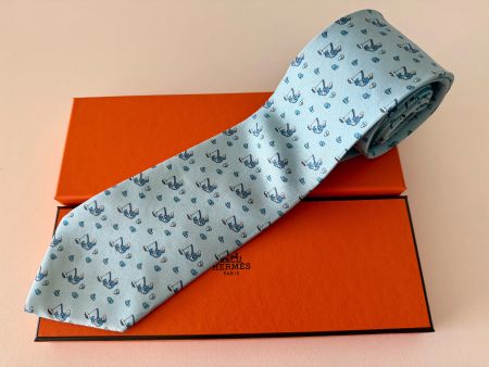 Cravate HERMES-Paris „Eskimo“ + petit box orange