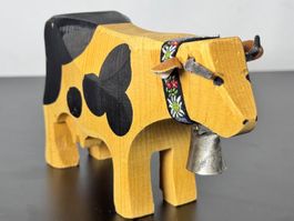 Petite vache suisse en bois avec cloche
