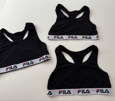 Drei FILA Sport Tops