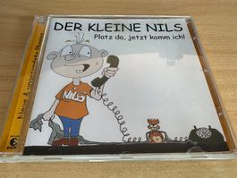 Der kleine Nils Platz da, jetzt komm ich!