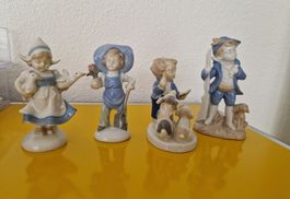 Vier Kinderfiguren Porzellan DDR