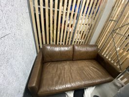 Brown Leather Sofa - Stylish and Comfortable Seating!