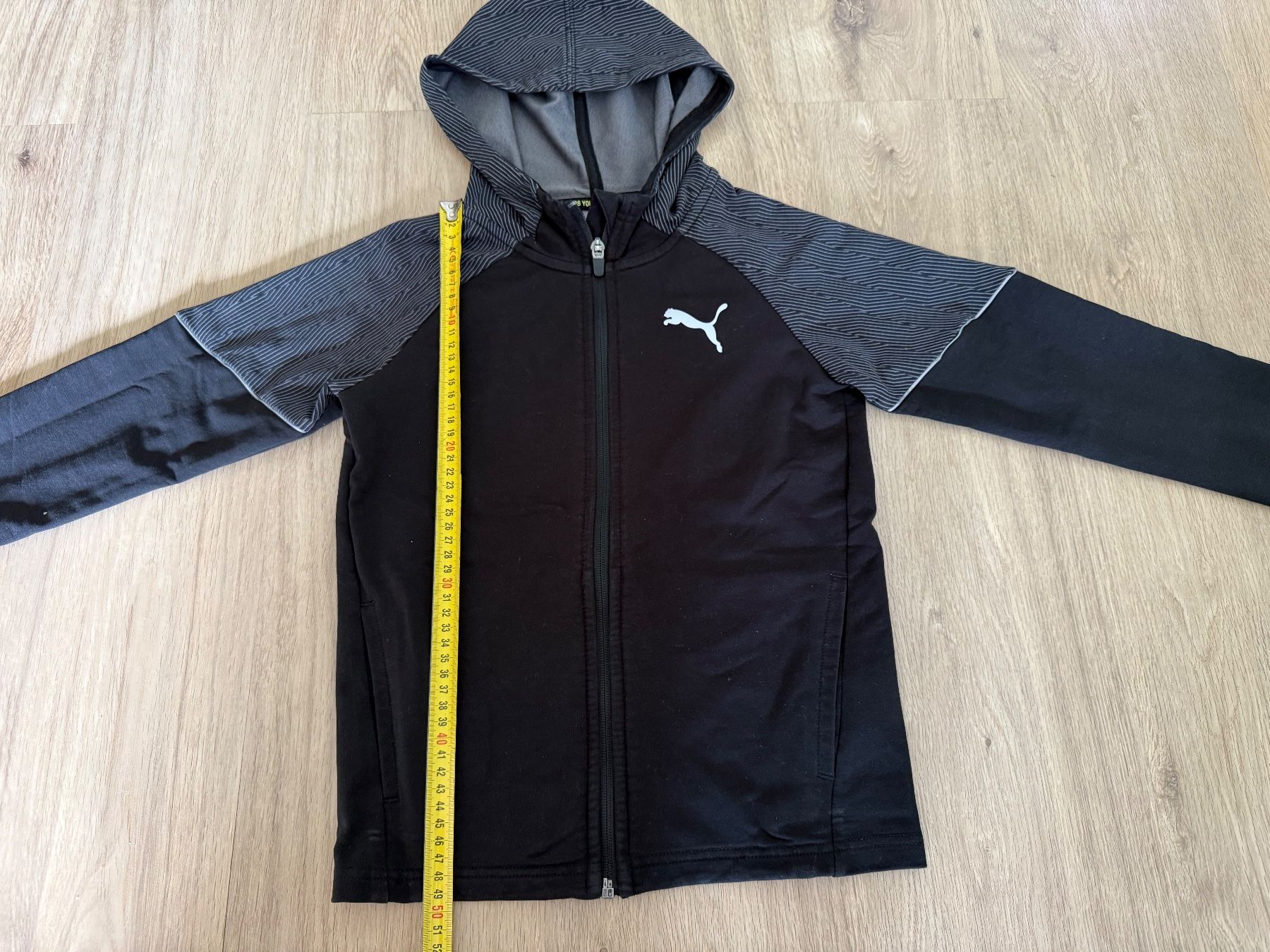 Puma Giacche: Schwarz-Graue Puma Trainerjacke Grösse 140 – Usato da Oberburg venduto da Serbus