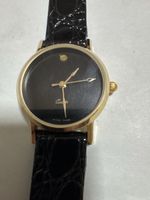 Montre femme quartz bracelet cuir noir boîtier doré