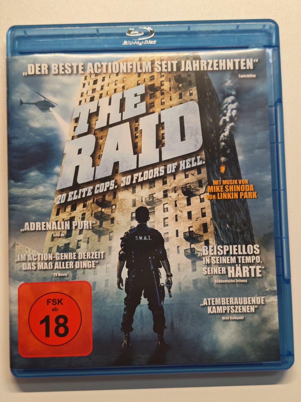 Alle DVDs: The Raid – Gebraucht aus Liestal von Kratzilla