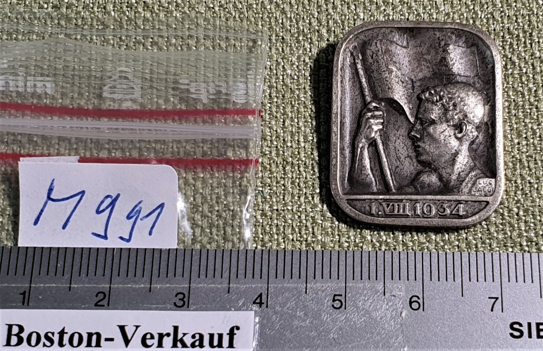 Medaglie: M991 - Brosche 1. VIII 1934 / 1. August 1934 Abzeichen – Usato da Reinach BL venduto da Boston-Verkauf 2