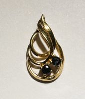 Eleganter Goldanhänger 18Karat mit Saphiren