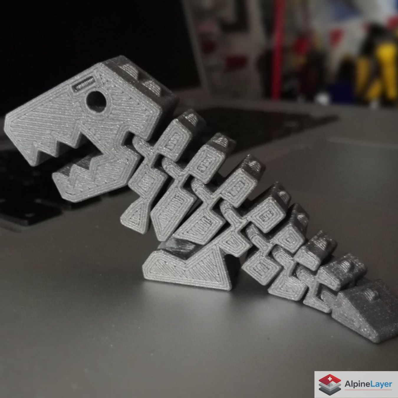 Giocattoli: Flexi Rex Articulated 3D Printed Dinosaur Silver – Nuovo (secondo la descrizione) da Losone venduto da AlpineLayer