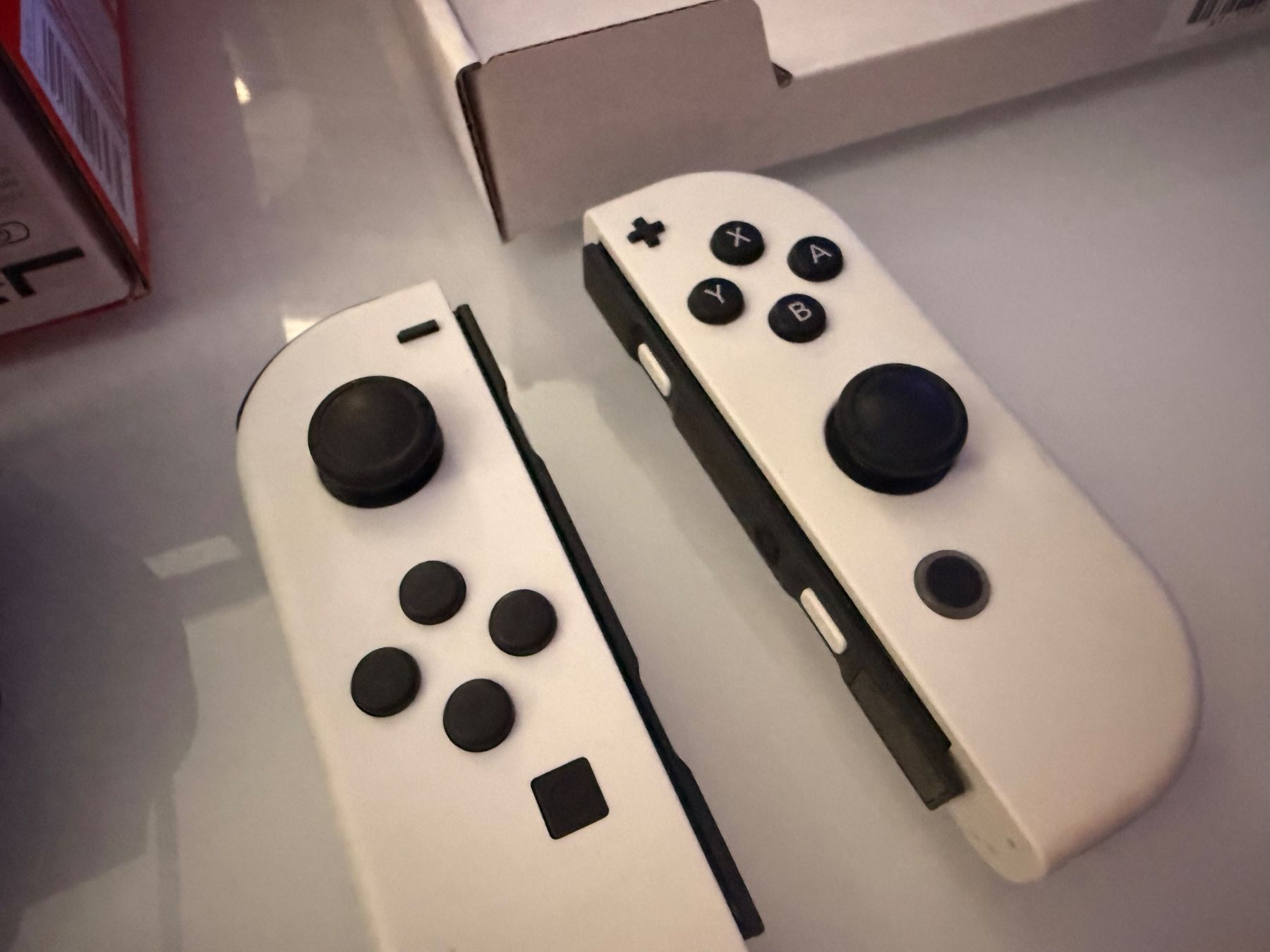 Nintendo Console: Nintendo Switch OLED Weiss + Pro Controller ab CHF 49.- – Usato da Bern venduto da Symsonic 3